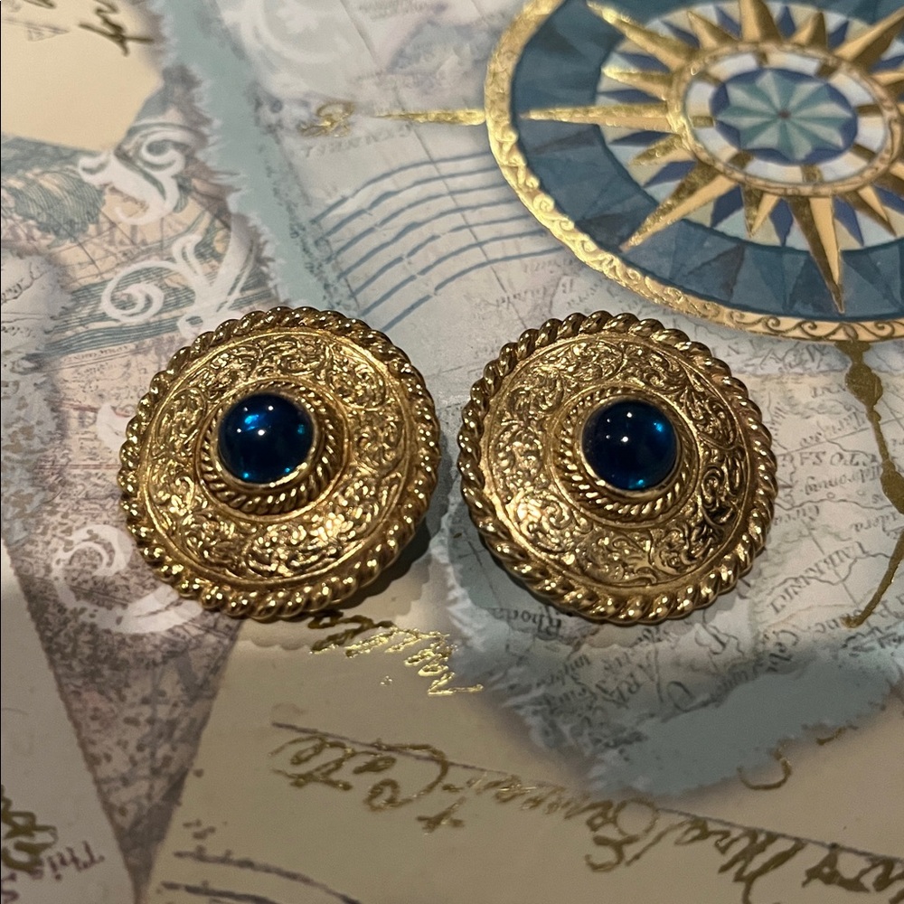 Givenchy clip-on earrings with a blue cabochon stone & ornate goldtone metalwork